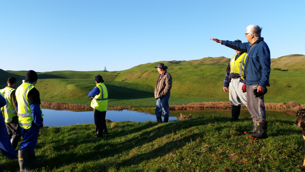 An image of local kaumatua telling the history of the planting site.